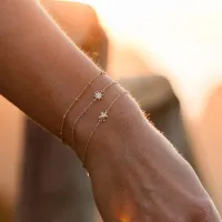 Verguld armbandje 'Go Slow' met schildpadje