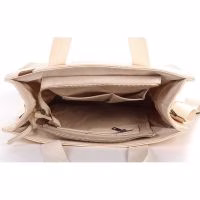 Shopper met vakjes en ritsjes en afneembare schouderband.