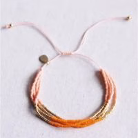 Prachtig vierdubbel zalm, oranje en goldplated Miyuki armbandje - Verrasjelief