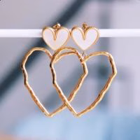 Prachtige stainless steel Statement oorbellen met parelmoer hartje - Verrasjelief