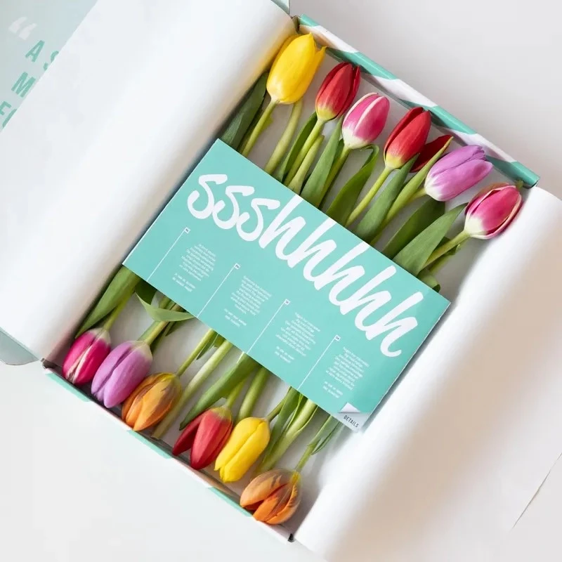 Echte tulpen door de brievenbus met kaartje