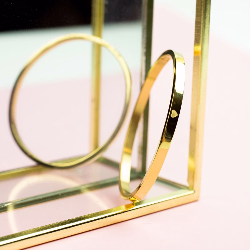 Bangle armband met hartje in goud of zilver