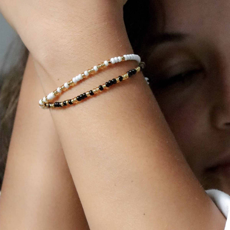 Armbandje van Return to Sender met Morsecode 'geluk en liefde' of 'hoop en kracht'