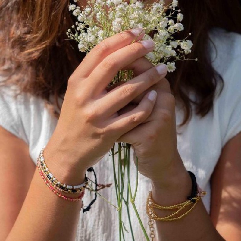 Armbandje van Return to Sender met Morsecode 'geluk en liefde' of 'hoop en kracht'