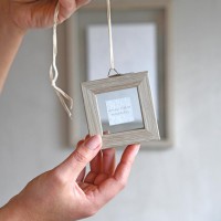 Een houten fotolijstje met boodschap als brievenbuscadeautje!